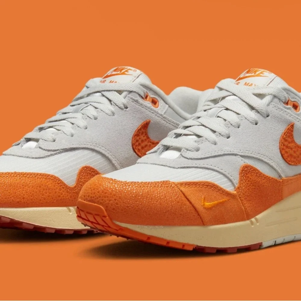 Nike Air Max with Orange and White Accents - Picture 1 of 7